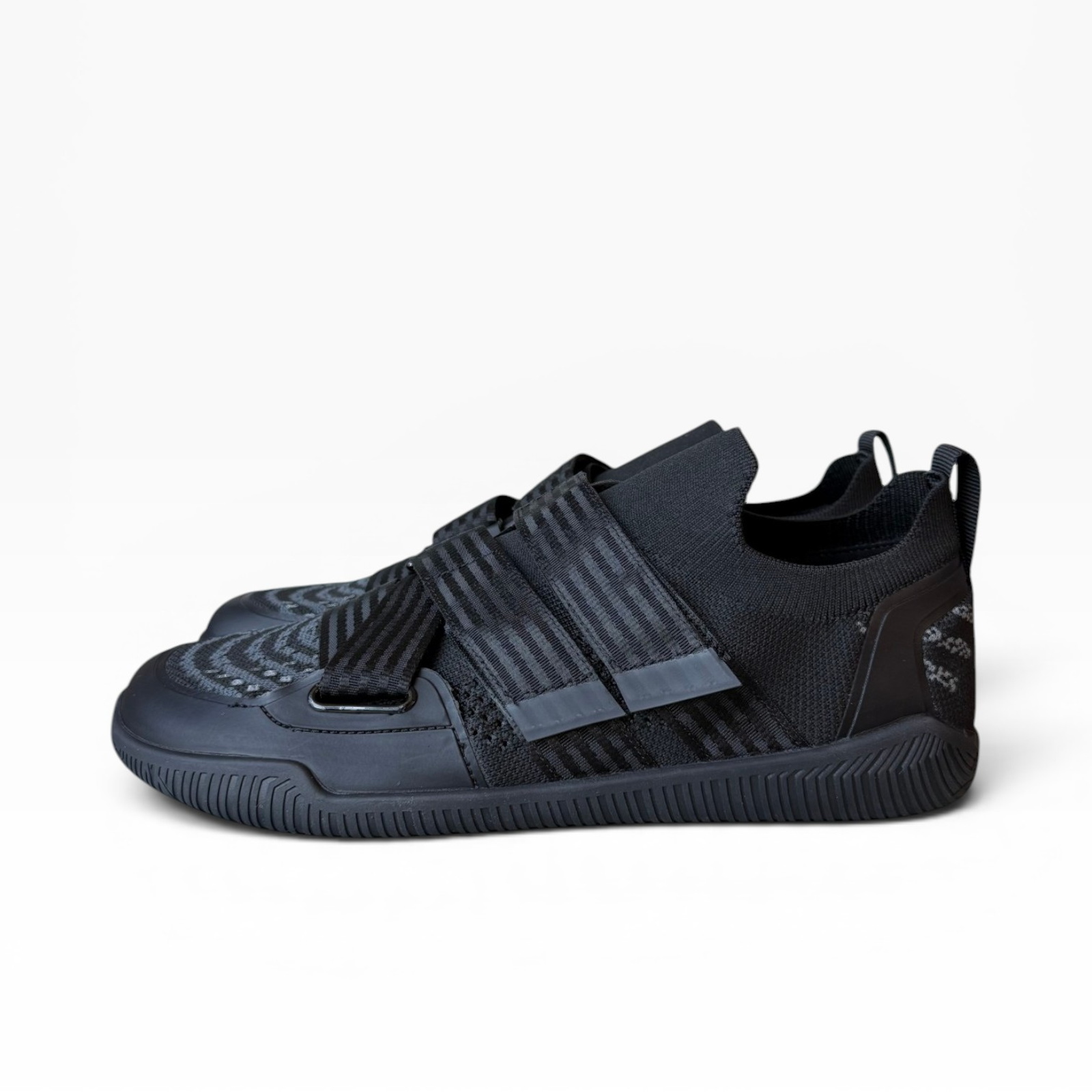 Style A strap lifting shoe on a clean white background